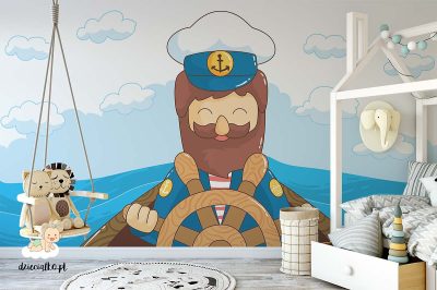 sailor at the helm with the waves in the background - children’s wall mural
